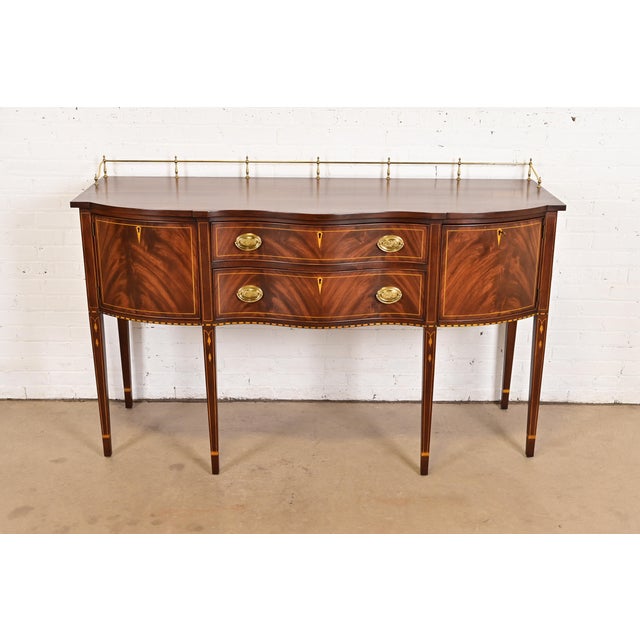 A gorgeous Hepplewhite or Federal style serpentine front sideboard, buffet, or credenza By Henkel Harris USA, Circa Late...