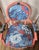 Introduce an absolute masterpiece of functional art into your space with The Coral Empress. This magnificent, jewel-toned...