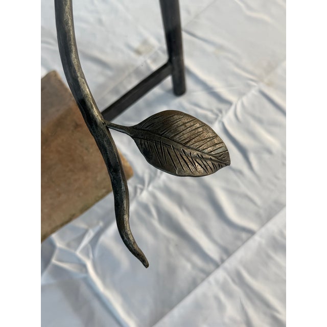 I love it because we search for found objects to repurpose them into beautiful furniture. Hand forged metal base with a...