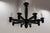 Eight-light french chandelier in black lacquered in carved wood, circa 1960. An imposing french chandelier from the 1940s,...