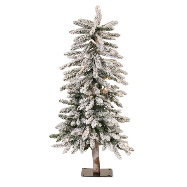 Add a touch of winter wonderland to your home with the LED Flocked Alpine Pencil Tree. Standing at 3 feet tall, this...