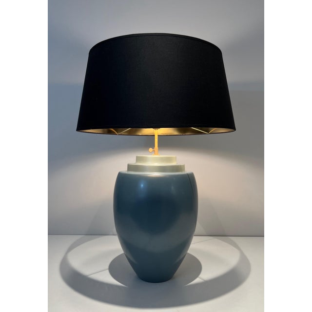 This decorative table lamp is made of blue ceramic. It is a Swedish work by Kosta. Circa 1970