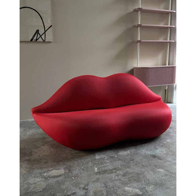 The Bocca sofa, designed by Studio 65 and produced by Gufram since the 1970s, is one of the most iconic pieces of 20th-...