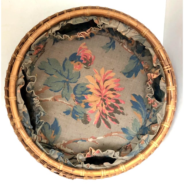 Large round basket with fitted lid. Both basket and lid are lined with fabric for storing sewing items. Top of lid has...