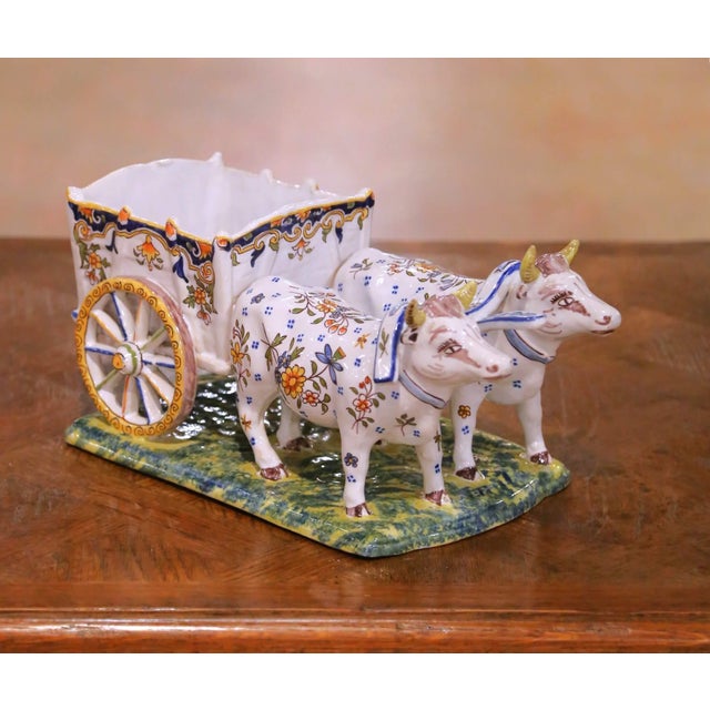 This early 20th century French faience planter or vide poche was crafted in Quimper and dates to circa 1920. Modelled as a...