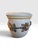Beautiful large-scale handmade Italian ceramic planter featuring an elegant raised fruit-and-leaf garland encircling the...