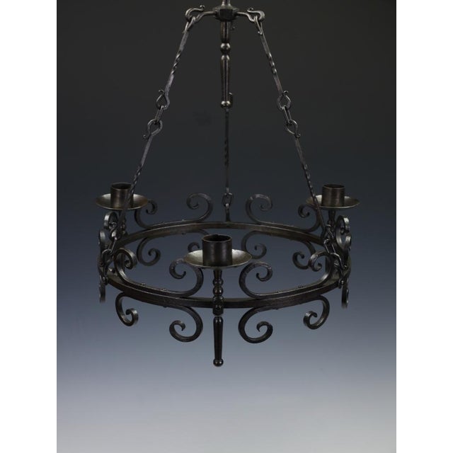 Late 19th Century Hand-Forged Wrought Iron Corona Chandelier, Gothic Revival c.1880 A substantial late 19th-century hand-...