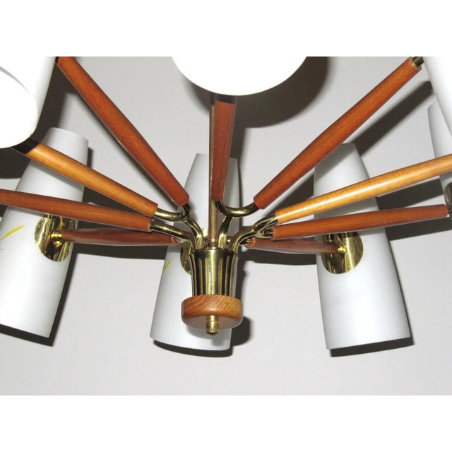 This large ceiling light was manufactured by Rupert Nikoll in Austria circa 1955. It is made from brass, beech and opaline...