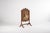 This 19-century Victorian fire screen is made of solid wood (most probably rosewood) and adorned with intricately carved...