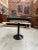 This table is in very good condition of use. It is encircled with brass a thick glass The covers height under tray: 63cm...