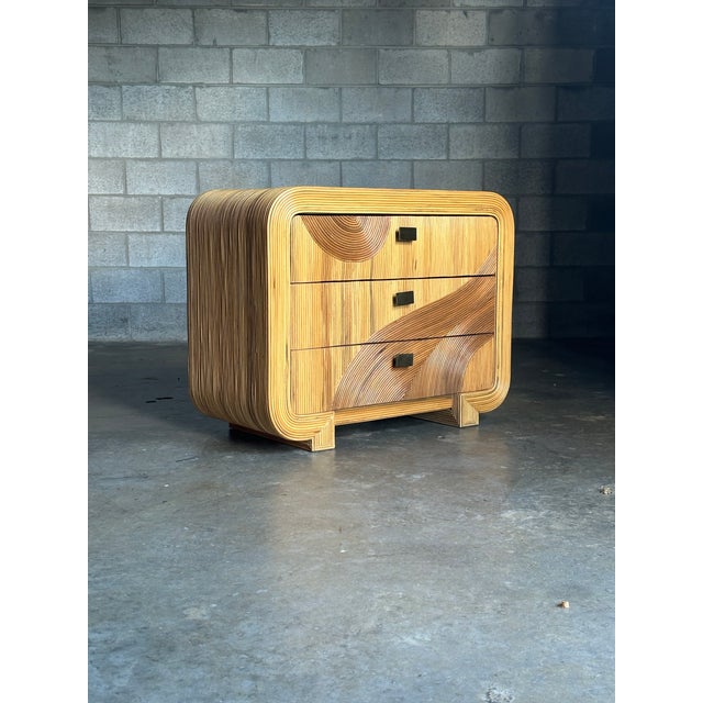 Wonderful pencil reed dresser with great organic styling. Features darker reeds to create beautiful movement through...