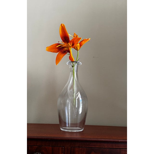 Elegant Baccarat crystal bud vase created for Tiffany & Co., featuring a graceful tapered silhouette, rounded shoulders,...