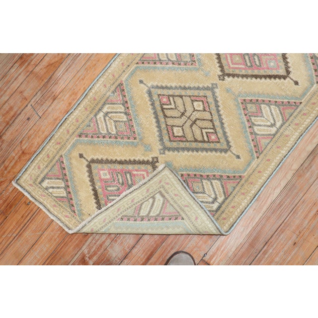 Mid-20th century Persian rug with a pretty geometric design. Measures: 2' x 4'2''.