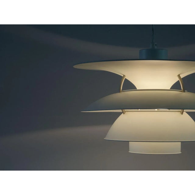 Iconic Danish design hanging lamp designed by the famous Poul Henningsen and in 1979 and 1984 revisited by Sophus Frandsen...