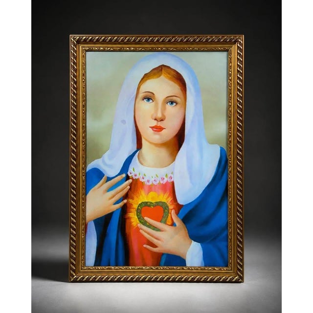 Framed religious portrait artwork featuring a classic devotional Sacred Heart style image with vivid blue, white, red, and...