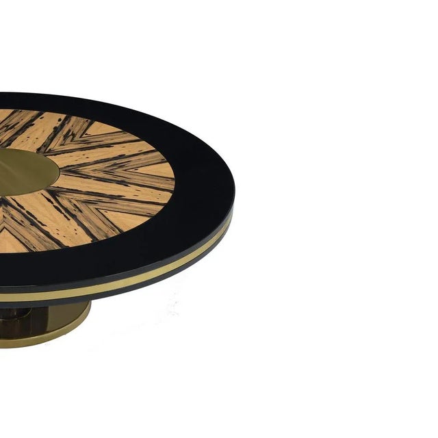 Ebony center table by memoir essence dimensions: d 120 x w 120 x h 27 cm. Materials: polished brass, lacquer and royal...