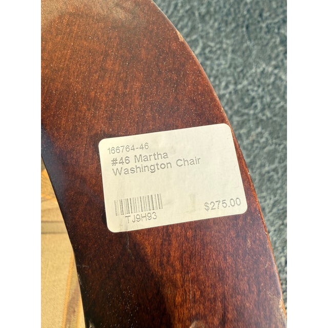 This elegant Martha Washington chair (also known as a lolling chair) features a timeless Federal-style silhouette. It is...