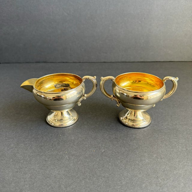 Sterling Silver Cream & Sugar Bowl Holiday Serving Pieces A timeless Sterling silver set, perfect to add to your holiday...