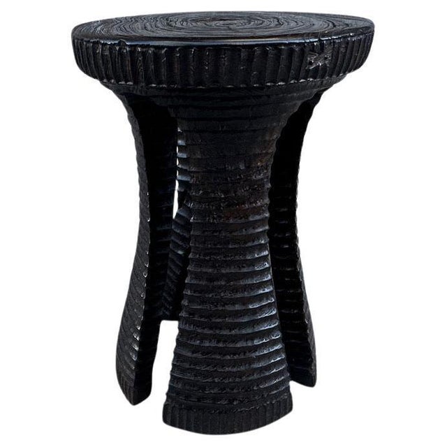 A century old teak wood mortar originally used to grind rice, is repurposed into a sculptural side table or stool. Part of...