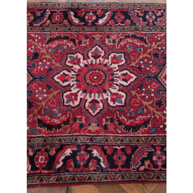 Hand-knotted rug from Heriz. High-quality high-altitude wool on a cotton warp. The rug has a typical motif for rugs from...