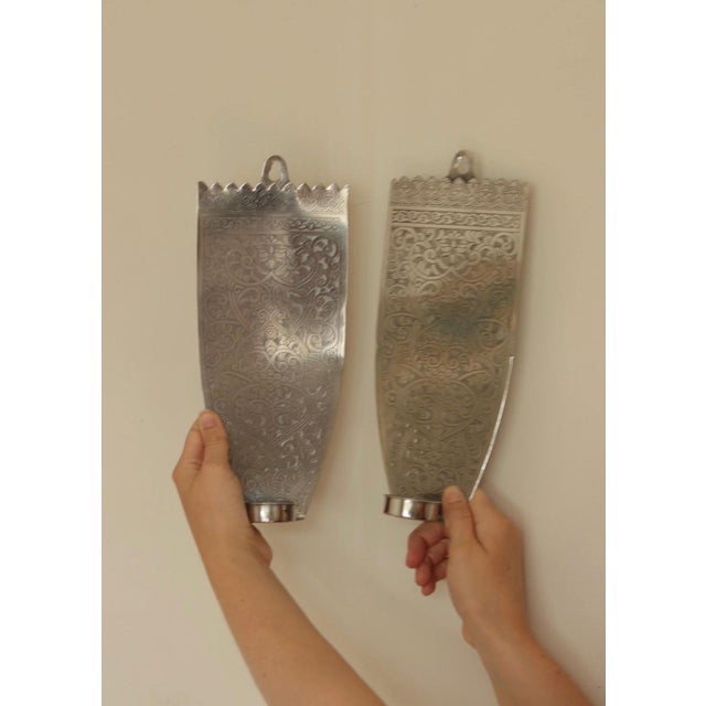 An amazing pair of Vintage Pewter Sconces wall sconces These engraved pieces are fascinating — the craftsmanship is very...