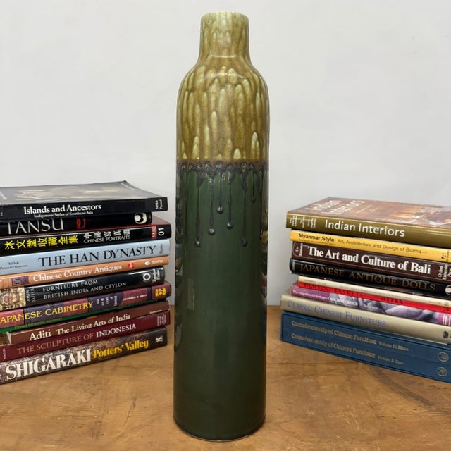 "About This Piece About This Piece This vase radiates energy and elegance, its surface alive with a striking interplay of...