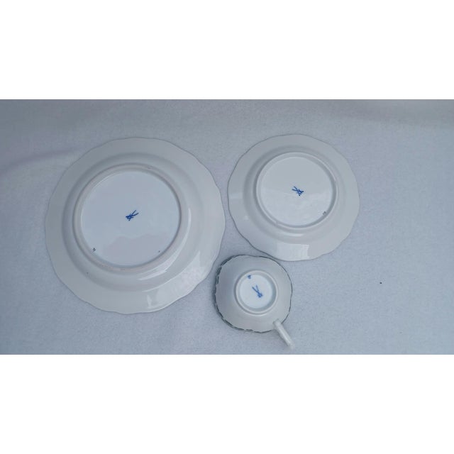 Vintage Meissen Porcelain Breakfast Trio Set, "Weinlaub" Pattern, 20th Century An elegant three-piece porcelain...