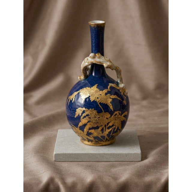 A fine antique Jean Pouyat Limoges porcelain bottle vase, marked J.P. with impressed shape number 501. This elegant French...
