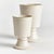 With traditional forms and footed base, these cachepots are classic silhouettes. What makes these pots unique is the deep,...