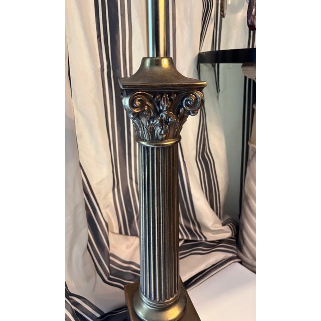 Classic column lamp with graceful lines and well detailed. 24 inches to top of socket.