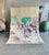 This Boujad rug was hand-knotted by Berber artisans in the Middle Atlas region of Morocco. The ivory wool ground is...