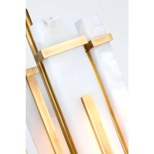 Malik Small Chandelier in Hand-Rubbed Antique Brass with Alabaster Designer: Ian K. Fowler Fixture Height: 18.75" Min....