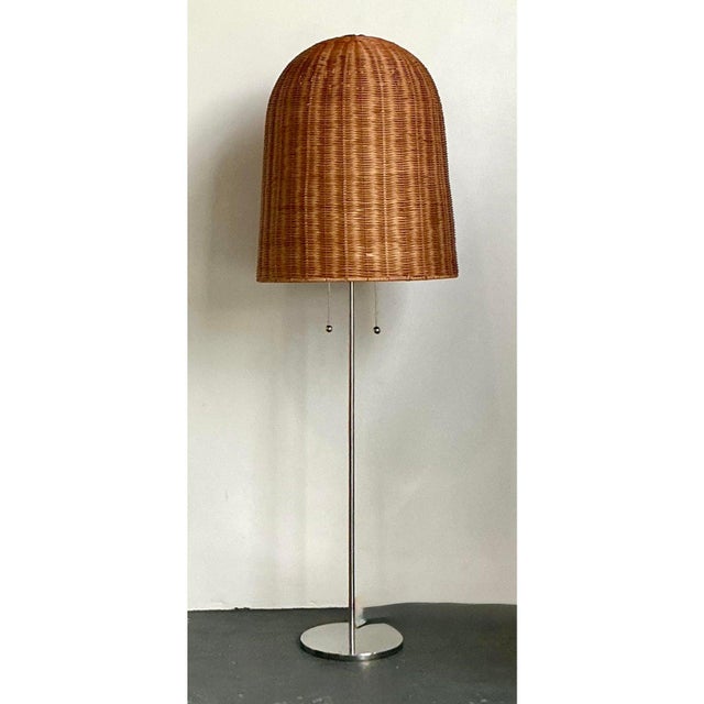 This stunning vintage floor lamp is a quintessential example of 1970s Boho Chic and Organic Modern design. Featuring a...