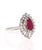 A beautiful ring with a 1.36 Carat Pear Cut Ruby as its center and 32 Round Cut Diamonds that weigh 0.58 Carats and 5...