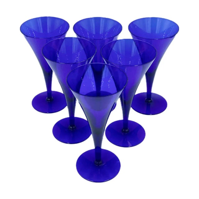 Details: -A stunning set of six vintage cobalt blue champagne flutes -Featuring an elegant, elongated silhouette and...