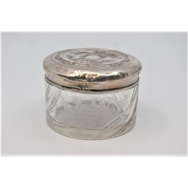 Acid-Etched Glass Bottle with Silver Lid and Floral Reliefs, in Good conditions.