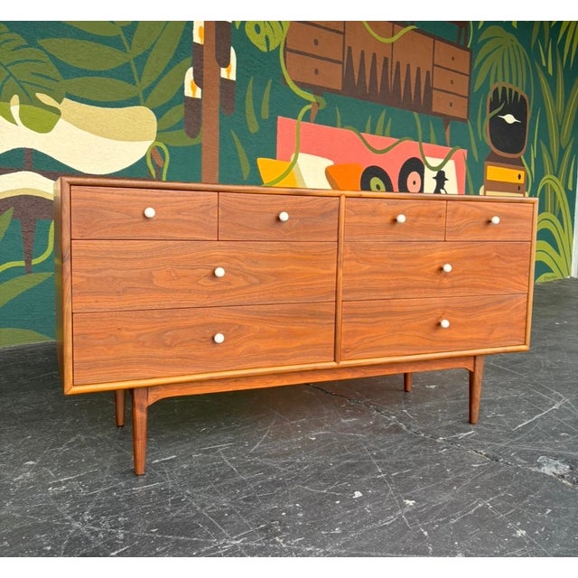 The iconic Drexel Declaration line, with its simple and stunning facade - striking walnut grain, signature white ceramic...