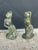 Standout pair of French bronze art deco figures depicting opposing nudes dressed as Egyptians with verdigris finish.
