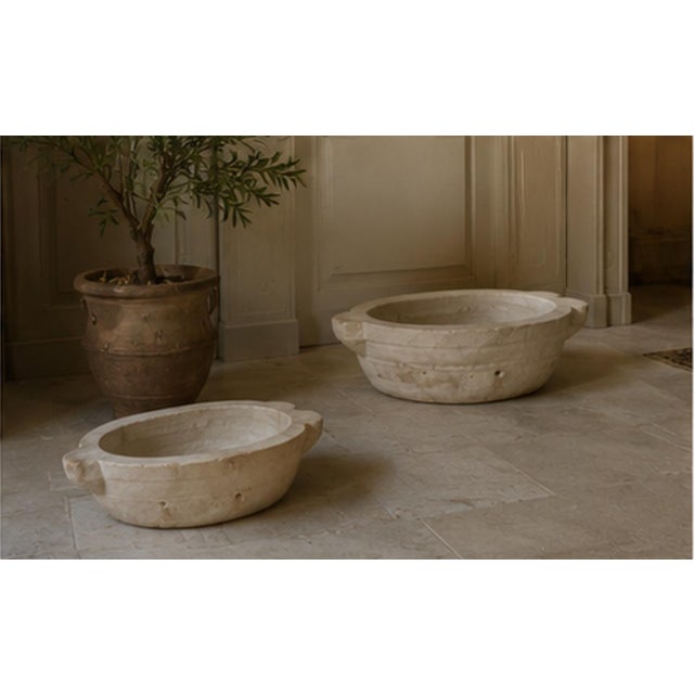 Authentic antique marble basin from Italy, dating to the early 20th century. Carved from solid marble, the piece features...