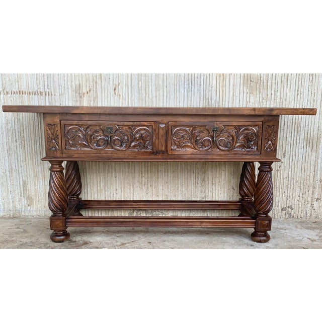 This large Spanish late 19th century features a beautiful one plank rectangular top over two carved drawers. Each drawer,...