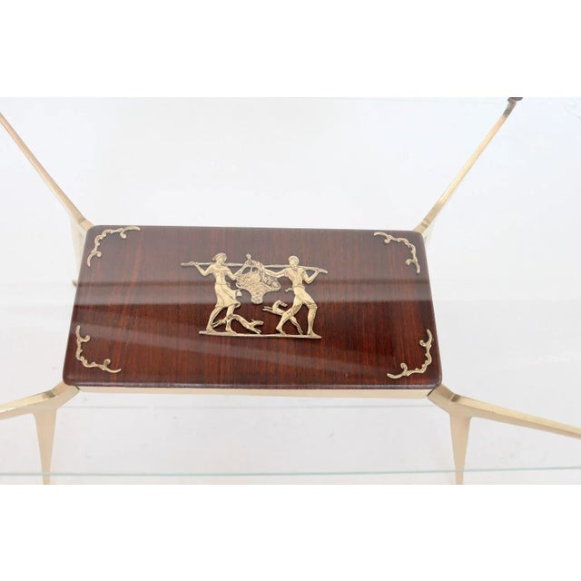 Gorgeous tiny coffee table made of full brass legs and details and mahogany plywood in the style of Cesare Lacca, Italy,...