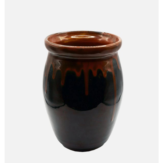 Kunsttöpferei kandern (1897-1927), bulbous vase with clay-colored gradient glaze on a black-blue ground, between 1914 and...