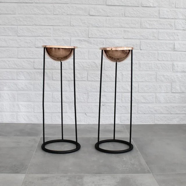 A pair of floor-standing ashtrays, model c34 by hans-agne jakobsson ab in markaryd, sweden, dating back to the 1950s....