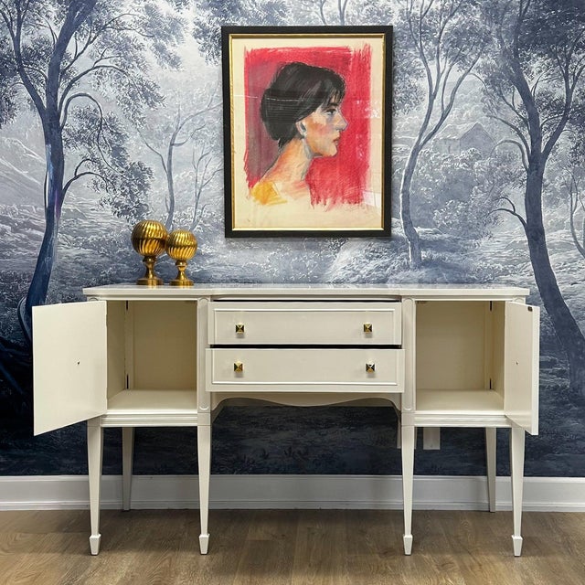 This vintage buffet sideboard cabinet provides an elegant dining room storage solution with its pristine traditional...