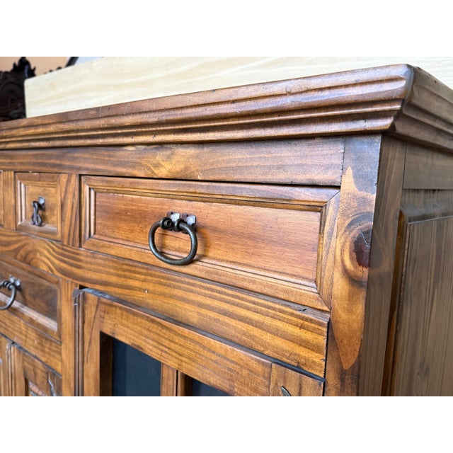 From Northern Spain, constructed of solid light oak, the rectangular top with molded edge atop a conforming case housing...