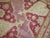 A rather unique Turkish rug with beautiful burgundy, pink and lavender colors. The graphic and design on this rug make it...