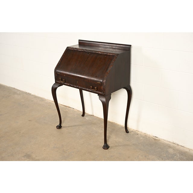 A gorgeous antique Victorian or Queen Anne slant front secretary desk or writing desk In the manner Berkey & Gay USA,...