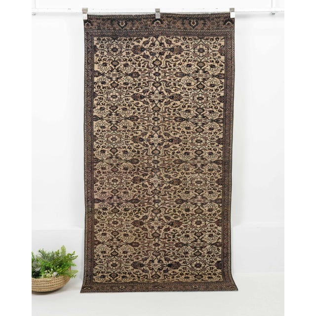Vintage Turkish Hand-Knotted vintage rug is a semi-antique vintage Area rug.'70s Eastern region of Turkey's unique rug is...