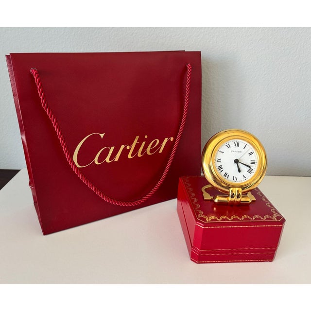 Vintage Cartier 24-karat gold-plated Art Deco travel quartz desk clock with alarm. Cartier Paris 24-karat gold-plated and...