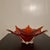 Murano glass centerpiece bowl, on orange and red. Leaf shaped autumny colors, it has its Murano glass sticker. This piece...